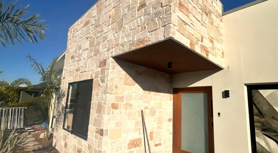 Exterior stone cladding on the facade of a contemporary home