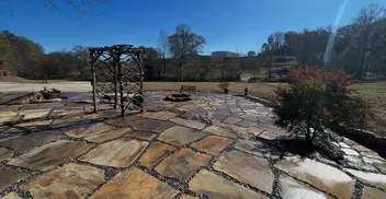 Flagstone patio in a backyard