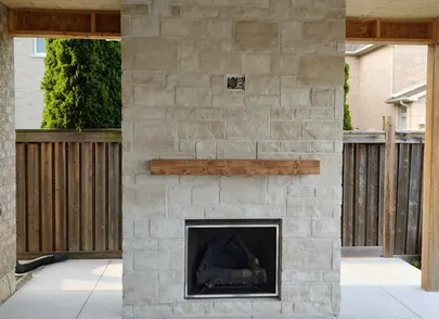 Tile Line Cap Outdoor Stone Fireplace Construction | East West Stone