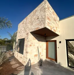 Stone-Clad Exterior on a Contemporary Home, photo 1
