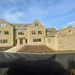 Cut-Stone Facade on a New Two-Story Home, photo 1