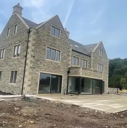 Cut-Stone Facade on a New Two-Story Home, photo 2
