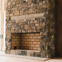 Floor-to-Ceiling Rustic Stone Fireplace, photo 2