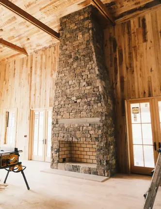 Floor-to-Ceiling Rustic Stone Fireplace