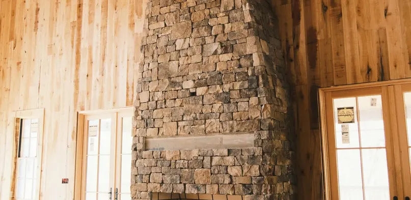 Floor-to-Ceiling Rustic Stone Fireplace