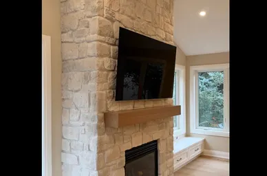 Light Stone Fireplace Wall in a Great Room detail