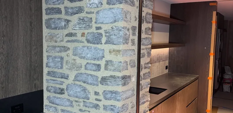Interior Stone Veneer Columns in an Open Kitchen