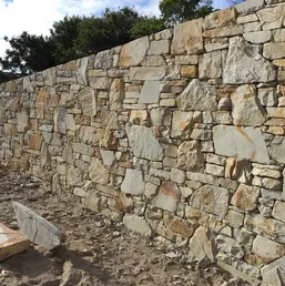 Natural Stone Wall Under Construction, photo 1