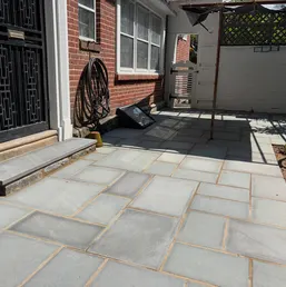 Rectangular Bluestone Patio Beside a Brick Home, photo 4
