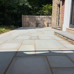 Rectangular Bluestone Patio Beside a Brick Home, photo 6