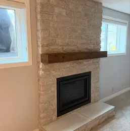 Stacked Stone Fireplace with Timber Mantel, photo 1