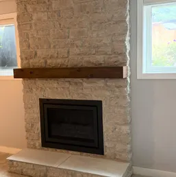 Stacked Stone Fireplace with Timber Mantel, photo 2
