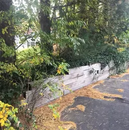 Stacked Stone Retaining Wall Along a Driveway, photo 4